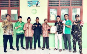 Peduli Pendidikan, GP Ansor Lawangagung Berikan Bantuan Paket Buku Kurikulum Merdeka di Kegiatan Baksos