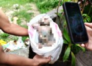 Mayat Bayi Mengapung di Sungai Brantas Jalan Juanda Kota Malang