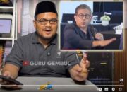 Sosok kritikus politik senior Rocky Gerung menuai sorotan dari Guru Gembul, seorang tokoh akademik dan konten kreator yang dikenal kritis. Dalam tayangan YouTube pribadinya episode ke-899 bertajuk 'Selamat Jalan Rocky Gerung, Tugas Kita Mencari Siapa Penerusnya', yang diunggah pada Selasa (29/7/2025).