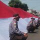 Momen Khidmat, Warga Malang Saksikan Pengibaran Bendera Merah Putih 3 x 80 Meter