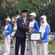 Peringatan Hari Pahlawan 2025 di Kota Malang menjadi momen bersejarah bagi insan olahraga, khususnya cabang olahraga (cabor) anggar. Setelah sempat tertunda karena kendala anggaran, akhirnya Pemerintah Kota Malang menyerahkan penghargaan dan bonus senilai total Rp75 juta kepada atlet, pelatih, dan pengurus cabor anggar yang berprestasi di ajang Porprov Jatim XI tahun 2022.